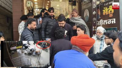 Two unidentified miscreants opened fire at a jeweller's shop