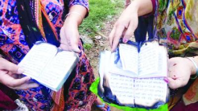 Colony Resident Showing Gutka Sahib