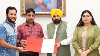  CM Mann gave green stamp papers to 2 industrialists 
