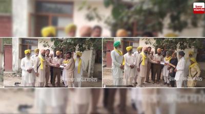 Checks distributed to the families of martyred women at Tikri border