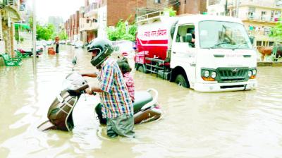 Vehicles passing through the Rainy water
