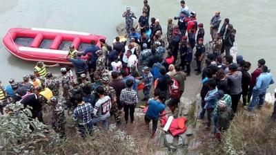 bus plunges into river