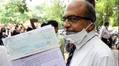 Prashant Bhushan pays Rs 1 fine