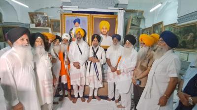 Portraits of Bhai Dilawar Singh and Giani Bhagwan Singh at the Central Sikh Museum
