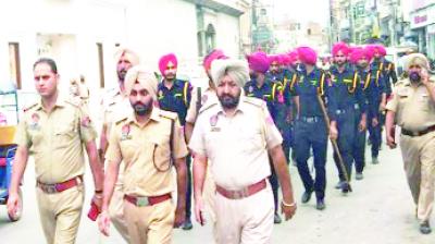 Police officers during the Flag March