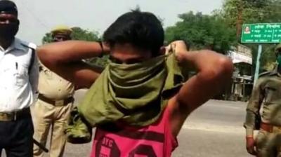 Deoria Police Man Forced To Cover His Face With Shirt Up