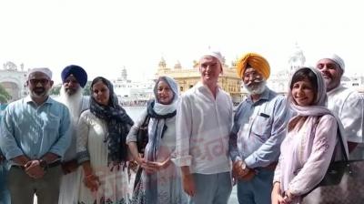 British High Commissioner Alexander Ellis pays homage to Golden Temple