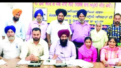 Satnam Singh Dhaliwal addressing a press conference