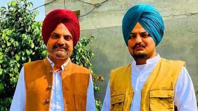 Balkaur Singh with lt. Sidhu moosewala (file photo)