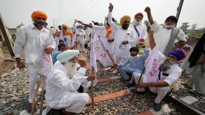 Farmers protest on railway track