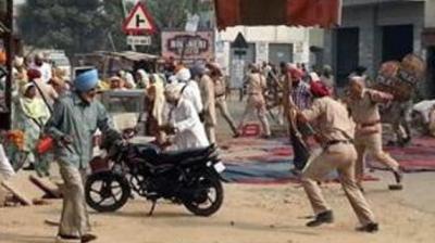 Police Firing on Protesters in Behbal Kalan