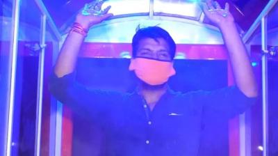 a 62 years old man uneducated makes automatic sanitization machine