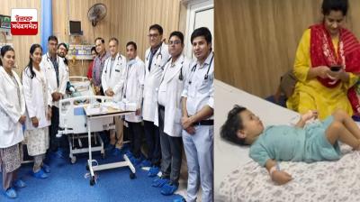 ਬੱਚੇ ਦੇ ਟੀਕਾ ਲੱਗਣ ਬਾਅਦ ਡਾਕਟਰਾਂ ਦੀ ਸਾਂਝੀ ਤਸਵੀਰ  