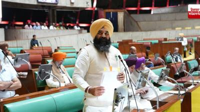 Deputy Speaker Raudi presents the Estimates Committee report during the Punjab Vidhan Sabha session.