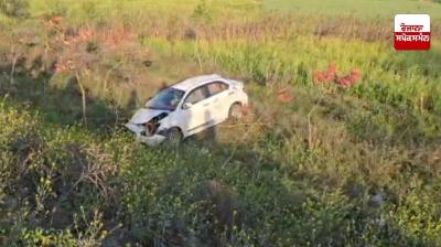 Car overturns and falls into fields due to sudden loss of balance