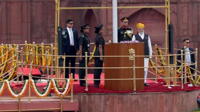 Women officers Major Nikita Nair and Major Jasmine Kaur  help PM unfurl flag 