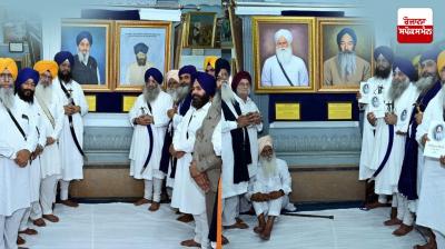 Photographs of four Sikh personalities were decorated in the Central Sikh Museum at Sri Darbar Sahib