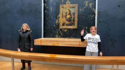 Protesters throw soup at Mona Lisa painting in Paris