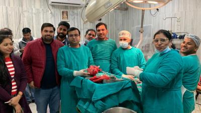 7kg tumour removed from woman's stomach