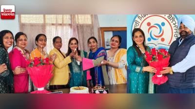 Bronze medal winning teacher honored by staff