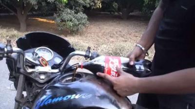 Hero honda glamours fuel tank filled with Coca Cola