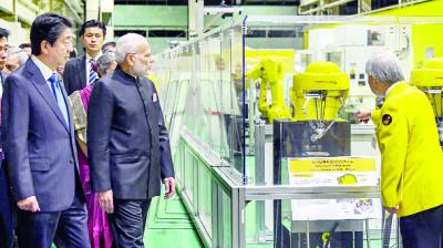 While visiting the industrial robot factory