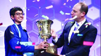 Kartik getting "Spelling BEE Title"