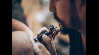 Abusive Tattoo on Chest