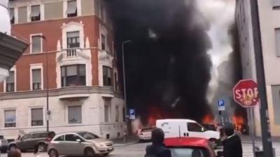 Explosion in centre of Milan leaves several vehicles on fire