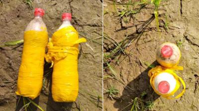 BSF troops recovered 2 bottles of suspected heroin 