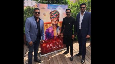 Extraordinary Journey of a Fakir; Gulzar Inder Chahal with the lead actor Dhanush 