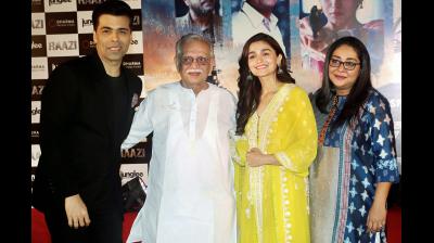 Bolywood Actor Alia Bhatt, Filmmaker Meghna Gulzar Lyricist Gulzar and Producer Karan Johar During an Event to celebrate the success of the film Razzi
