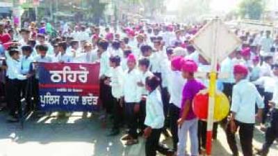 Students staged protest and blocked the road