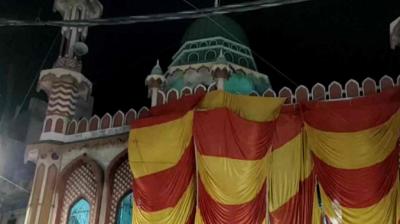 Halwaiyan masjid covered ahead of the holi festival in aligarh