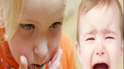 coin in child 's mouth 