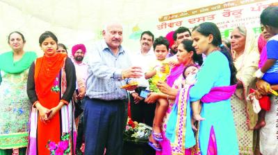 Brahm Mohindra Distributing ORS Packets