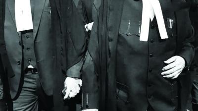 Denial of hearing on petition seeking exemption to lawyers from wearing coat and gown