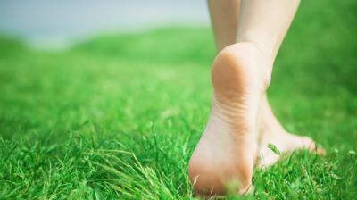  Walking barefoot on green grass eliminates many problems