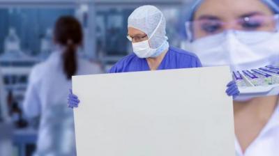 Who warns the world about spread corona virus via cured patients for economy 