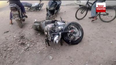 Two motorcycles collide, one youth dies