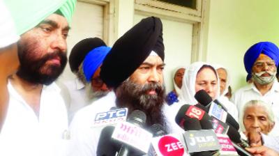 Sikh talking to Reporters