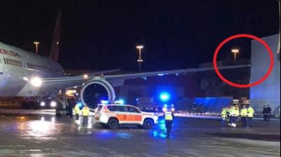 Air India flight hits building