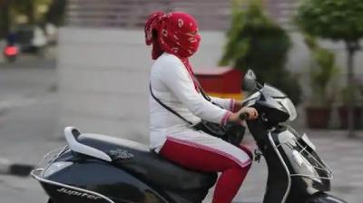 Women are not wearing helmets in Chandigarh