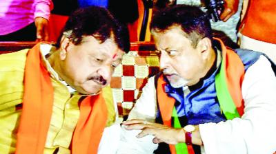 BJP national general secretary Kailash Vijayvargiya and party leader Mukul Roy discussions after the High Court verdict.