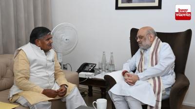 Governor Gulab Chand Kataria met Union Home Minister Amit Shah in Guwahati.