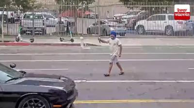 US police officer shoots man brandishing weapon on street, video goes viral