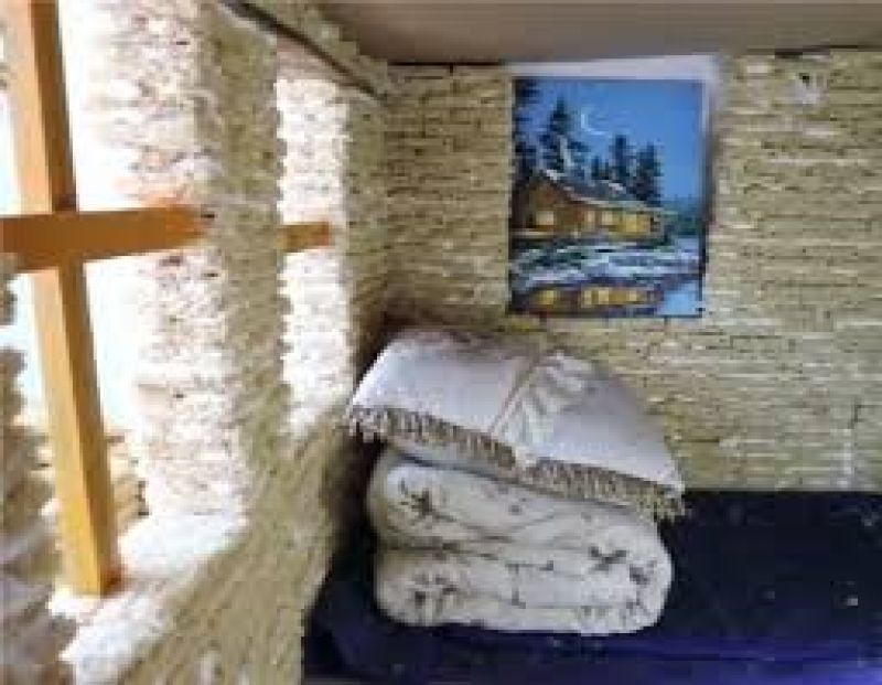 man builds childrens playhouse by instant noodle