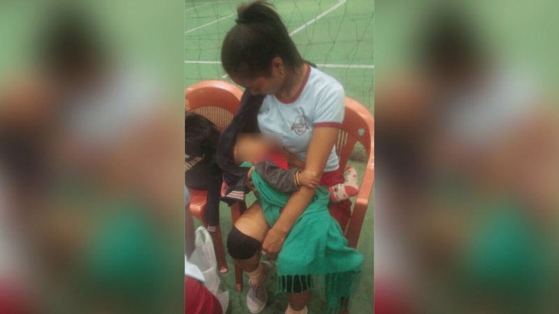 It’s viral! Volleyball player breastfeeds baby on field 