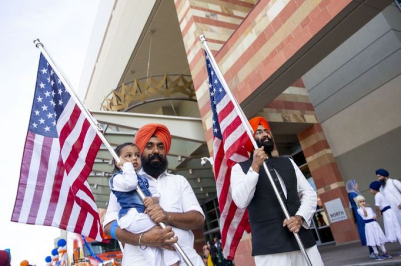 Sikhs with America Flags in their hands