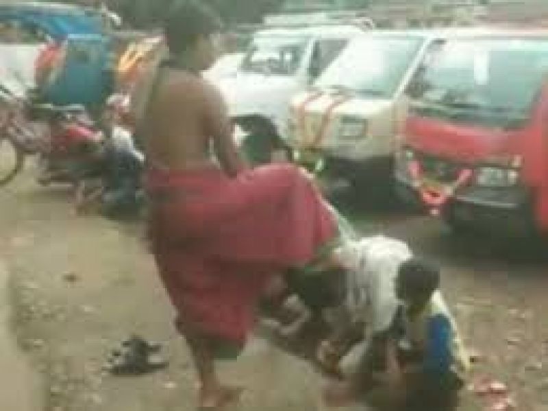 priest blessing by foot
